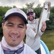 Happy Angler with baby tarpoon catch